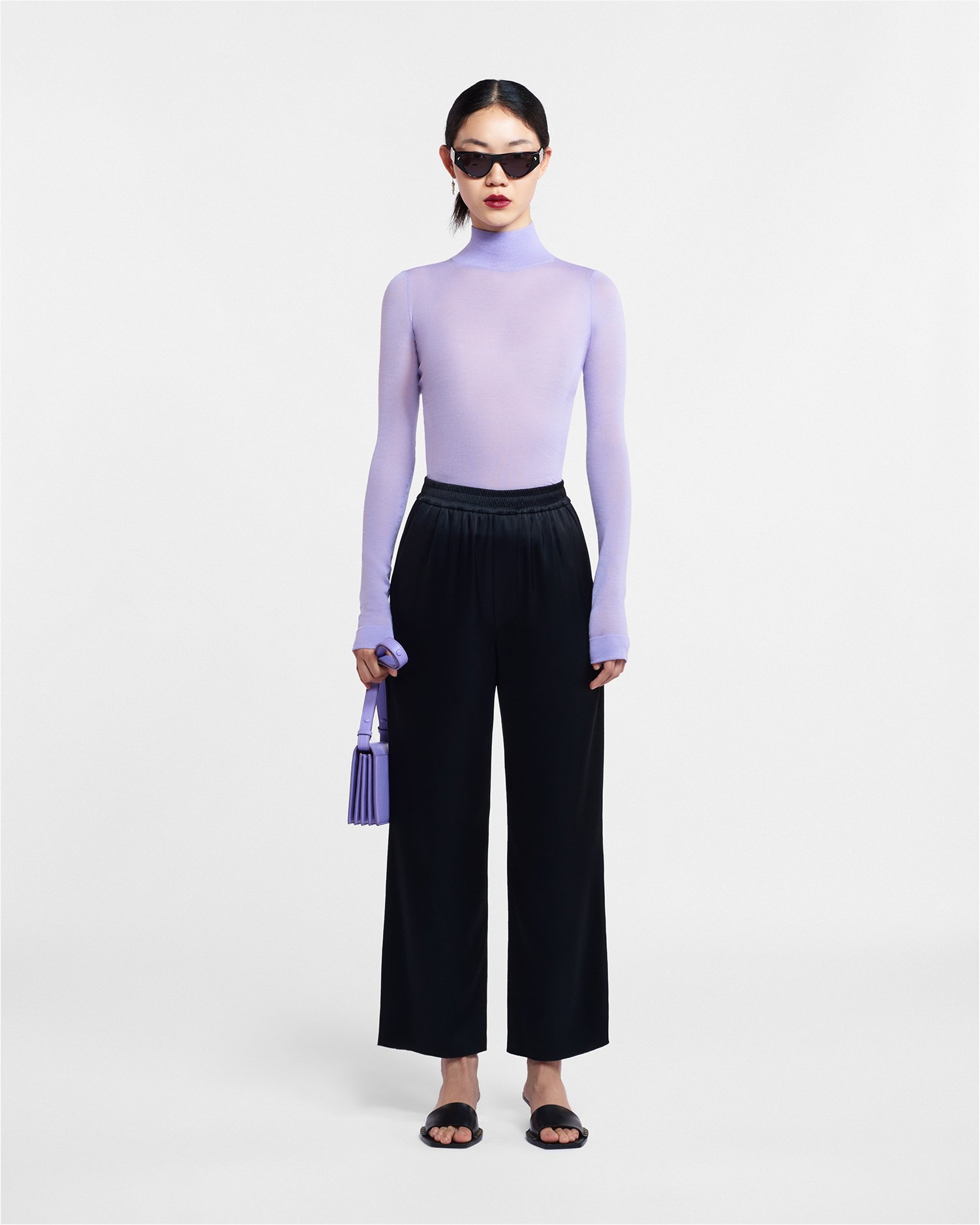 Nanushka e-commerce imagery, art direction by ANCC. Image 12 of 14.